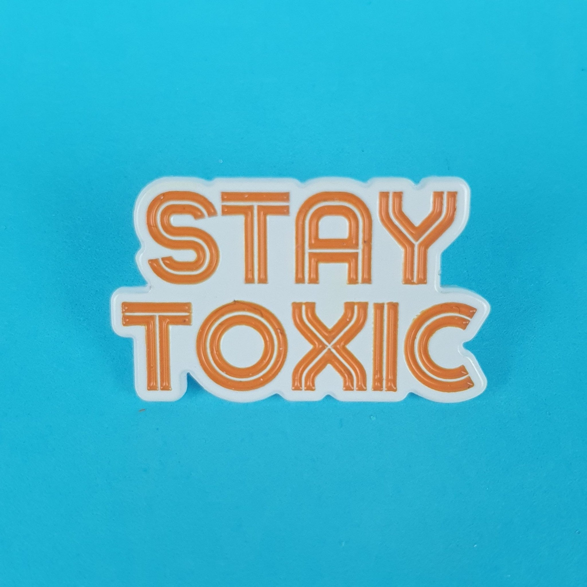 Stay Toxic Pin Badge – Dragged Out