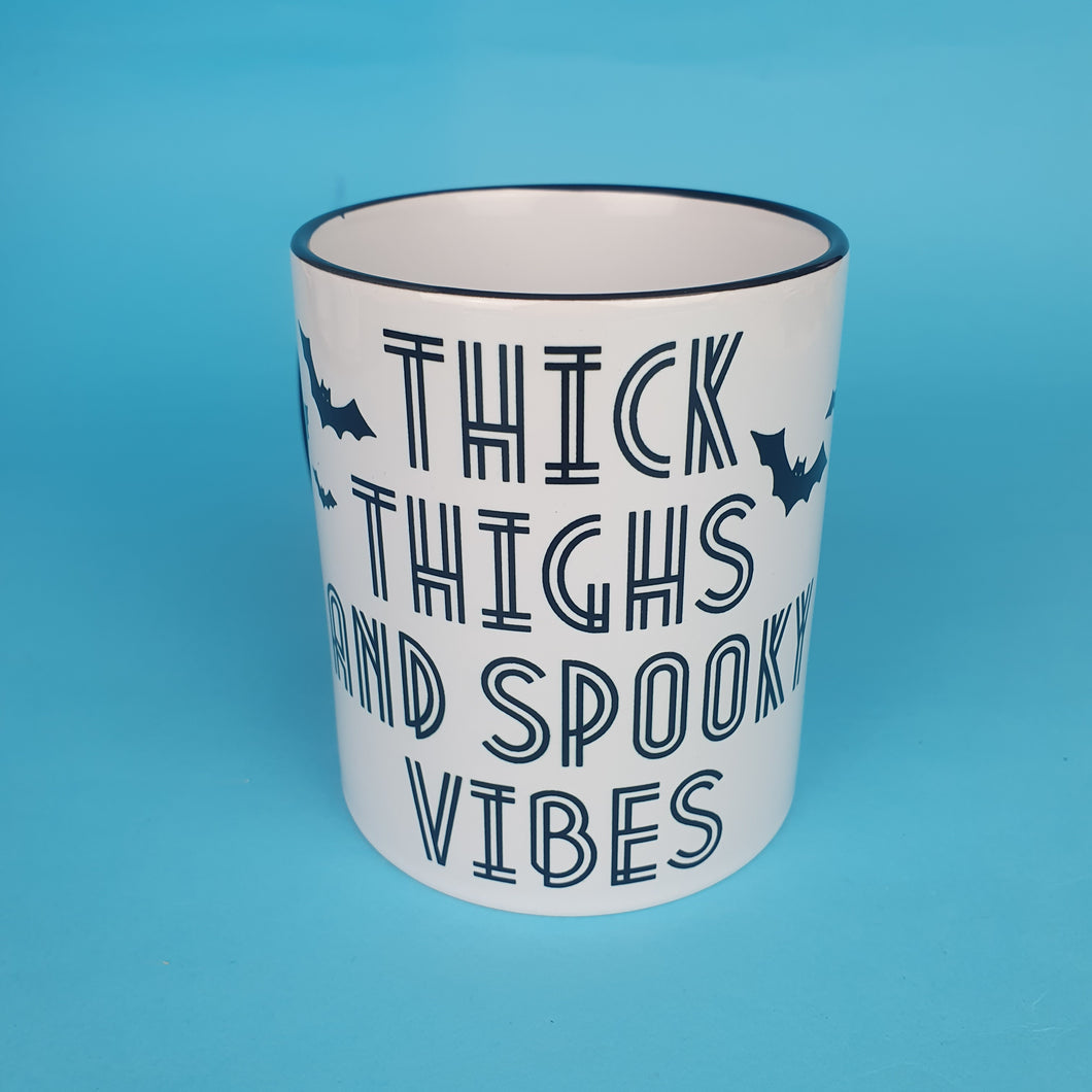 Thick Thighs And Spooky Vibes Mug